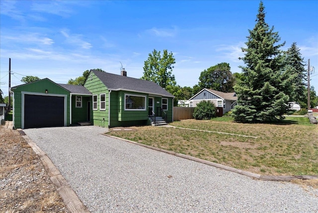 1403 N Farr Rd, Spokane, WA 99206 - view of front of home featuring a garage, gravel driveway, and roof with shingles