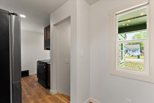 1403 N Farr Rd, Spokane, WA 99206 - corridor featuring light wood-type flooring and baseboards