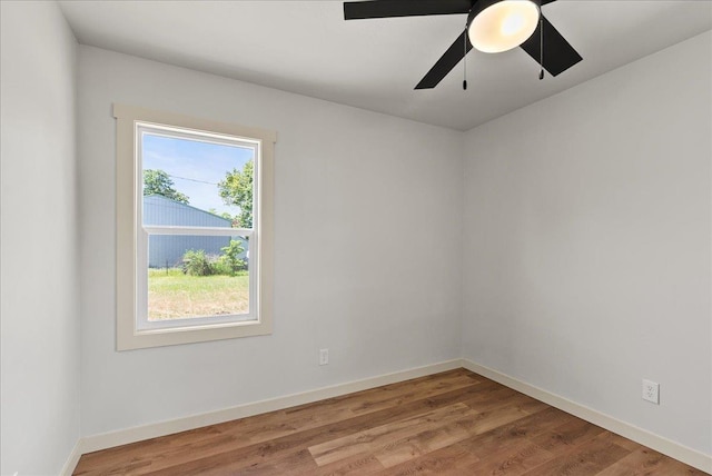 1403 N Farr Rd, Spokane, WA 99206 - empty room with baseboards, wood finished floors, and a ceiling fan