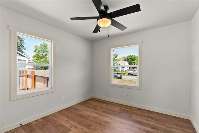 1403 N Farr Rd, Spokane, WA 99206 - spare room featuring wood finished floors and baseboards