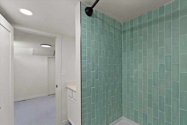 1403 N Farr Rd, Spokane, WA 99206 - bathroom with vanity, tiled shower, and baseboards