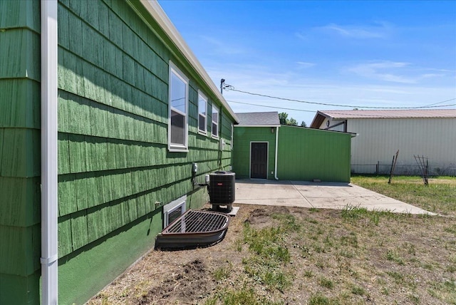 1403 N Farr Rd, Spokane, WA 99206 - view of yard featuring a patio and central air condition unit