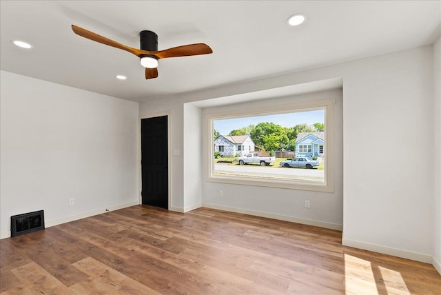 1403 N Farr Rd, Spokane, WA 99206 - spare room featuring light wood-type flooring, a ceiling fan, recessed lighting, and baseboards