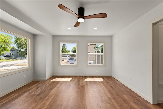 1403 N Farr Rd, Spokane, WA 99206 - spare room featuring baseboards, wood finished floors, ceiling fan, and recessed lighting