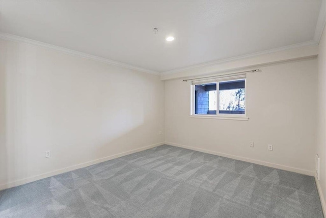 930 S Cowley St Unit 303, Spokane, WA 99202 - spare room featuring crown molding, carpet flooring, baseboards, and recessed lighting