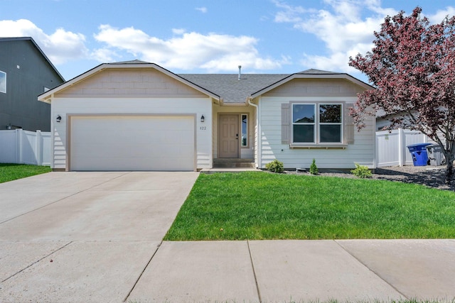 822 S Oswald St, Spokane, WA 99224 - ranch-style house featuring a garage and concrete driveway