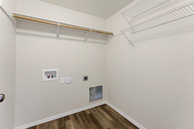 822 S Oswald St, Spokane, WA 99224 - washroom with electric dryer hookup, dark wood-style flooring, washer hookup, baseboards, and hookup for a gas dryer