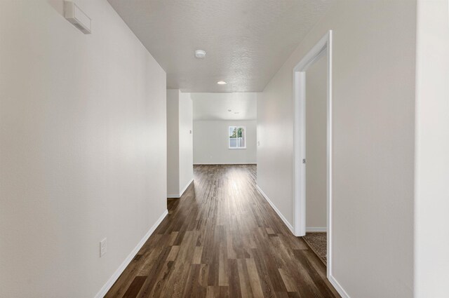 822 S Oswald St, Spokane, WA 99224 - corridor with dark wood-style floors, baseboards, and recessed lighting