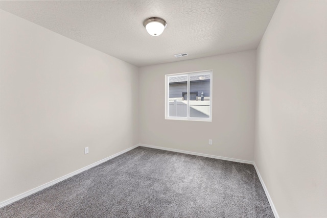 822 S Oswald St, Spokane, WA 99224 - empty room with carpet flooring, a textured ceiling, and baseboards
