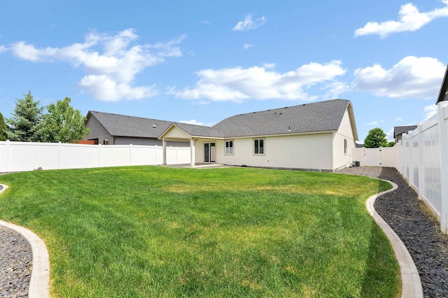 822 S Oswald St, Spokane, WA 99224 - rear view of property with a patio area, roof with shingles, and central AC