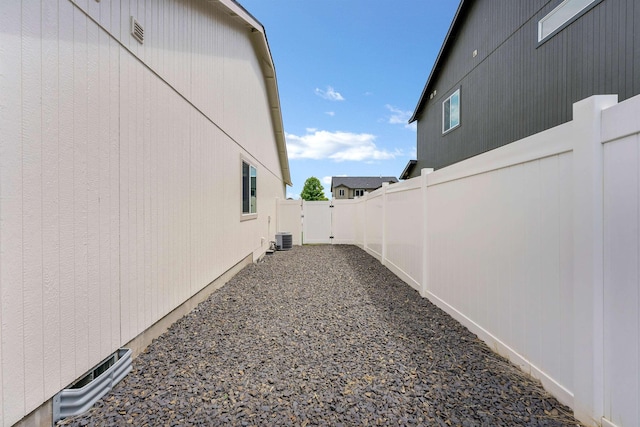 822 S Oswald St, Spokane, WA 99224 - fenced backyard with cooling unit and a gate