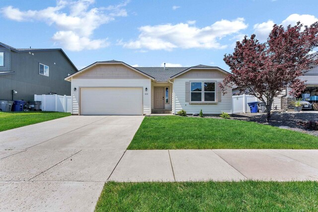 822 S Oswald St, Spokane, WA 99224 - single story home featuring an attached garage and driveway