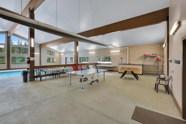 28600 N Mt Spokane Park Dr Unit 603, Mead, WA 99021 - game room featuring beam ceiling, plenty of natural light, high vaulted ceiling, and concrete floors
