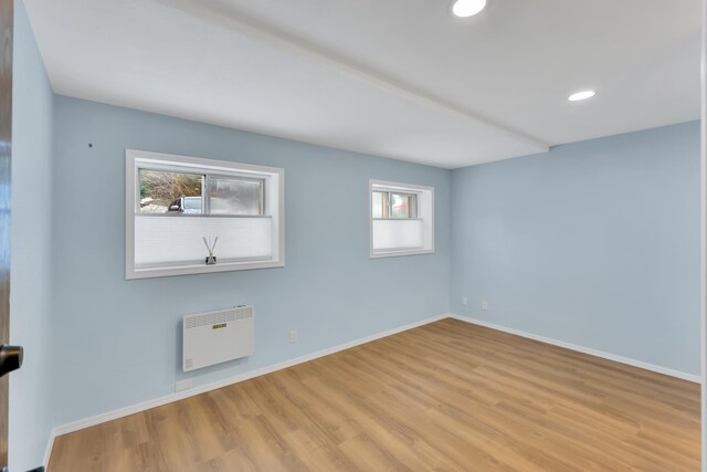 28600 N Mt Spokane Park Dr Unit 603, Mead, WA 99021 - unfurnished room featuring wood finished floors, plenty of natural light, baseboards, and recessed lighting