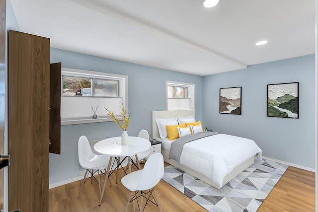 28600 N Mt Spokane Park Dr Unit 603, Mead, WA 99021 - bedroom with wood finished floors, baseboards, and recessed lighting