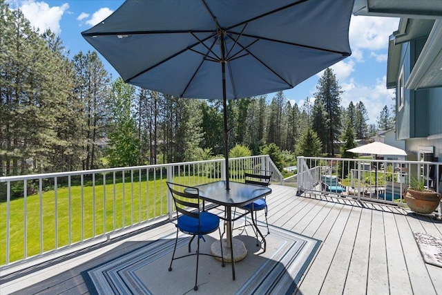4510 E Bixel Ct, Mead, WA 99021 - wooden deck featuring outdoor dining area and a yard