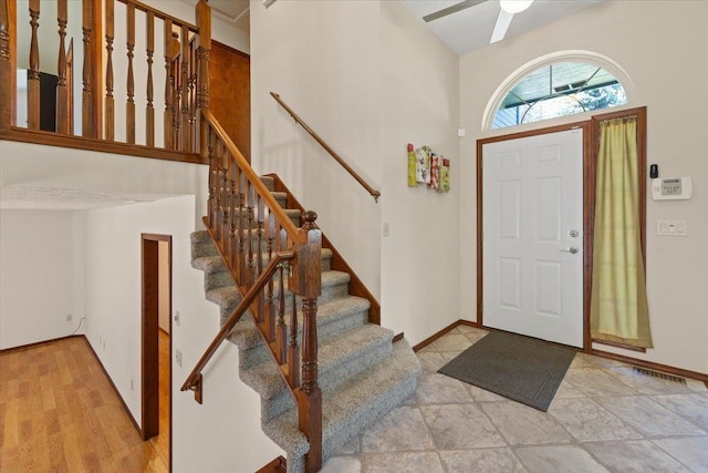 4510 E Bixel Ct, Mead, WA 99021 - foyer entrance with stairs, a ceiling fan, and baseboards