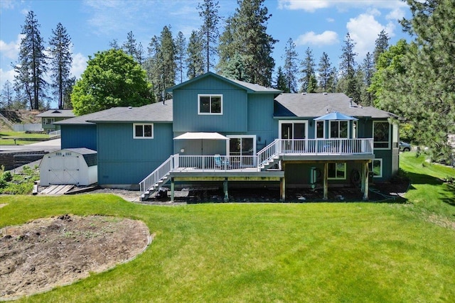 4510 E Bixel Ct, Mead, WA 99021 - rear view of property featuring stairway, a wooden deck, a lawn, and a sunroom