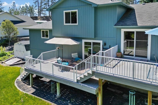 4510 E Bixel Ct, Mead, WA 99021 - rear view of property featuring roof with shingles, a deck, and stairs