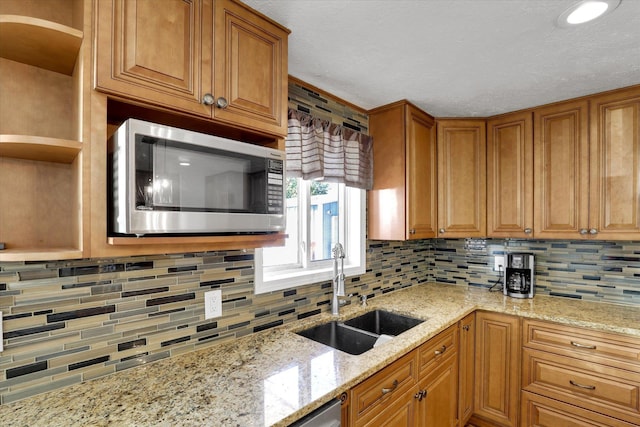 7312 E Euclid Ave, Spokane Valley, WA 99212 - kitchen with stainless steel microwave, a sink, open shelves, tasteful backsplash, and a textured ceiling