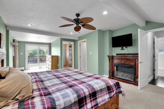 7312 E Euclid Ave, Spokane Valley, WA 99212 - carpeted bedroom featuring access to outside, a glass covered fireplace, baseboards, recessed lighting, and ceiling fan