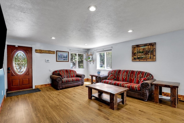 7312 E Euclid Ave, Spokane Valley, WA 99212 - living room with wood finished floors, a textured ceiling, recessed lighting, and baseboards