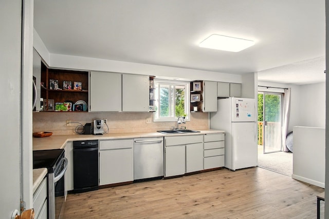 14018 E Valleyway Ave, Spokane, WA 99216 - kitchen with open shelves, stainless steel appliances, a sink, and light countertops