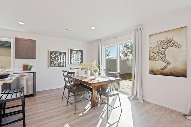 713 E L St, Deer Park, WA 99006 - dining space featuring light wood-style floors, baseboards, and recessed lighting