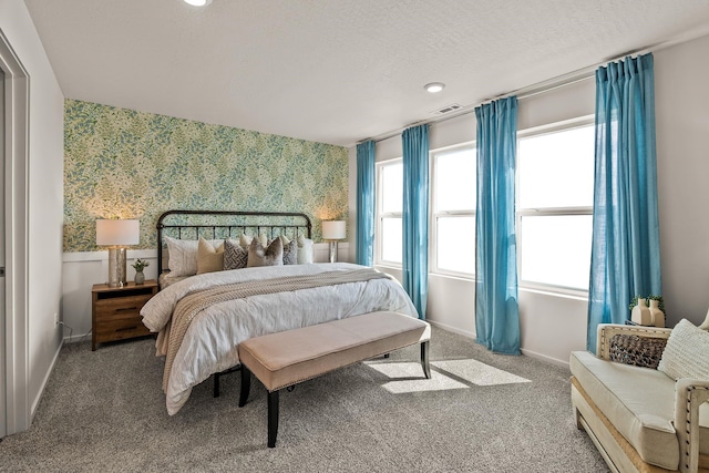 5111 E Frederick Ave, Spokane, WA 99217 - bedroom featuring wallpapered walls, baseboards, carpet floors, multiple windows, and recessed lighting