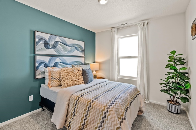 5111 E Frederick Ave, Spokane, WA 99217 - bedroom featuring carpet flooring, a textured ceiling, and baseboards