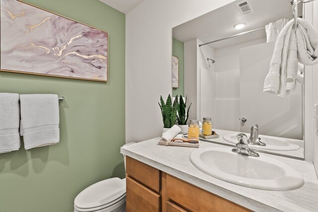 5111 E Frederick Ave, Spokane, WA 99217 - full bath with vanity, a shower, and toilet
