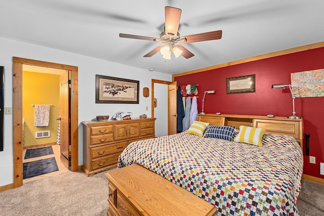 312 Pickett Rd, Ione, WA 99139 - bedroom featuring light carpet, a ceiling fan, and connected bathroom