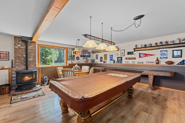 312 Pickett Rd, Ione, WA 99139 - playroom featuring a wood stove, hardwood / wood-style floors, billiards table, and beam ceiling