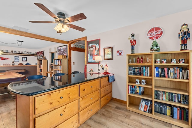 312 Pickett Rd, Ione, WA 99139 - office area with light wood-type flooring, ceiling fan, and baseboards