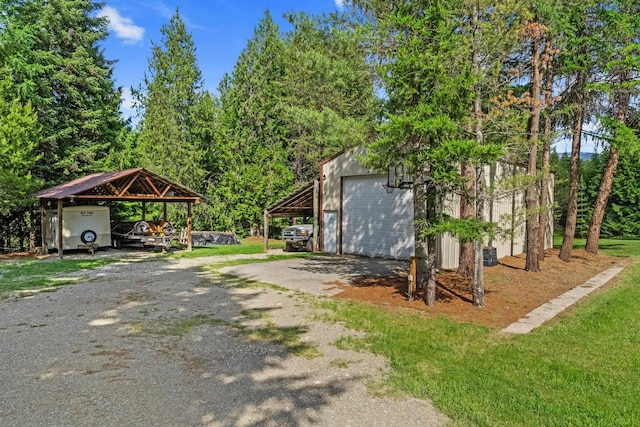 312 Pickett Rd, Ione, WA 99139 - garage featuring a garage and dirt driveway