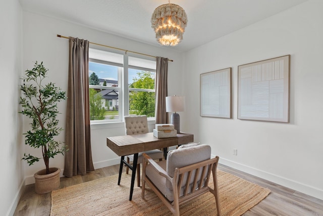 1217 E Granary Ct, Spokane, WA 99208 - office featuring a chandelier, light wood-style floors, and baseboards