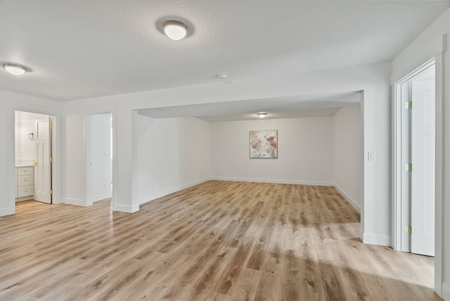 1217 E Granary Ct, Spokane, WA 99208 - below grade area with light wood finished floors and baseboards