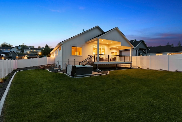 1217 E Granary Ct, Spokane, WA 99208 - back of house at dusk featuring a deck