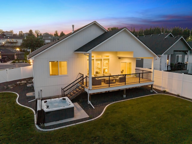 1217 E Granary Ct, Spokane, WA 99208 - rear view of property with a hot tub and a wooden deck