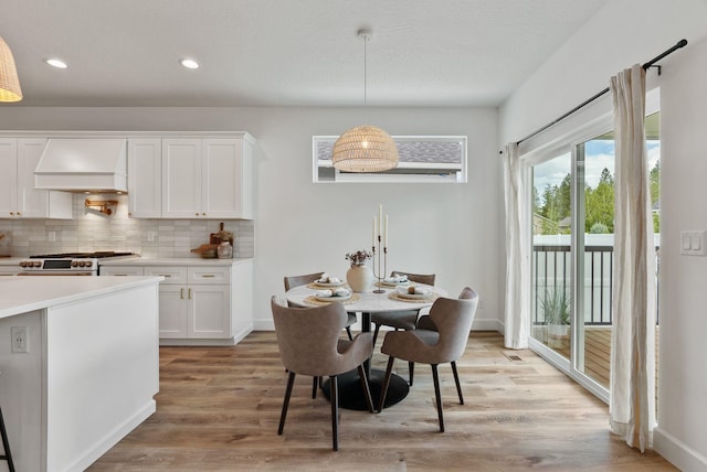 1217 E Granary Ct, Spokane, WA 99208 - dining area with light wood-style floors, recessed lighting, and baseboards