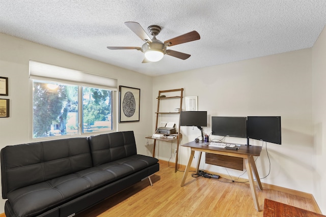 3014 S Perry St Unit 3014, Spokane, WA 99203 - office space with wood finished floors, ceiling fan, baseboards, and a textured ceiling