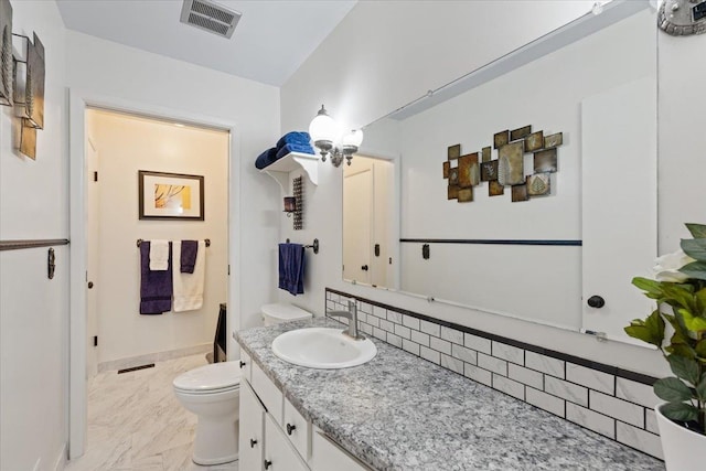 6913 S Ben Burr Rd, Spokane, WA 99223 - full bathroom featuring toilet and vanity