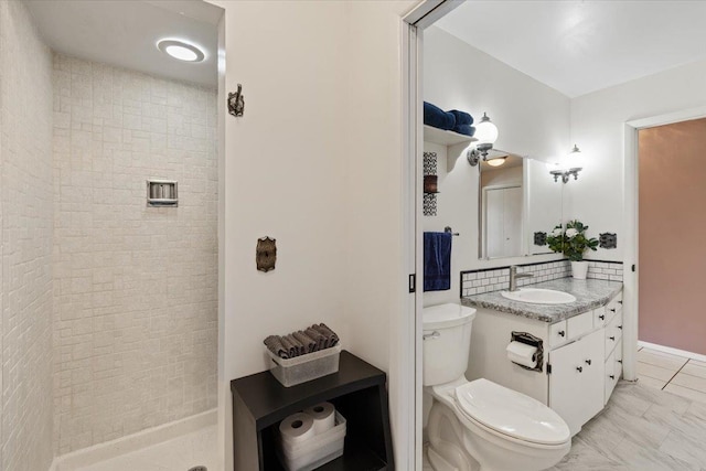 6913 S Ben Burr Rd, Spokane, WA 99223 - bathroom with vanity, tiled shower, and marble finish flooring