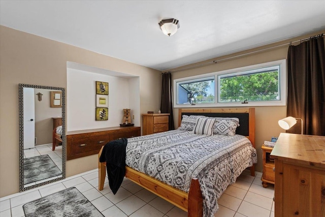 6913 S Ben Burr Rd, Spokane, WA 99223 - bedroom featuring light tile patterned flooring