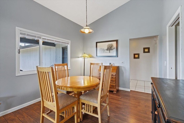 6913 S Ben Burr Rd, Spokane, WA 99223 - dining room featuring dark wood-type flooring and high vaulted ceiling