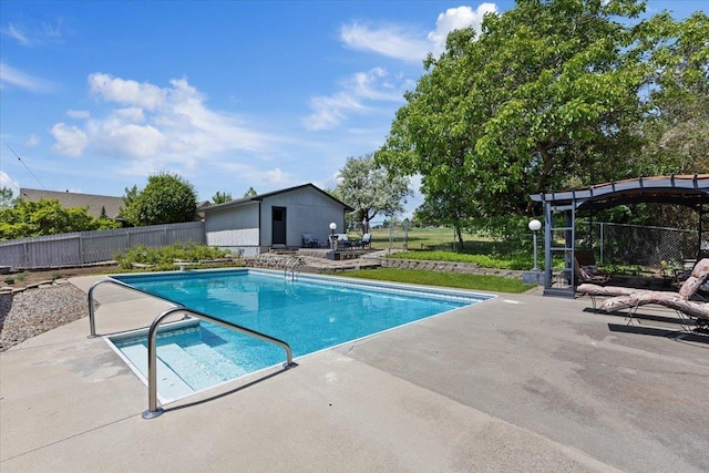 6913 S Ben Burr Rd, Spokane, WA 99223 - view of swimming pool with a patio and an outdoor structure