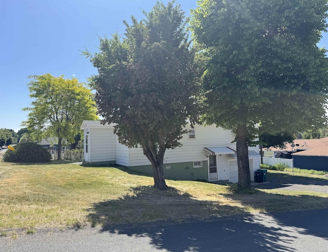 216 NW Cole Ave, Wilbur, WA 99185 - view of property exterior with a garage and driveway