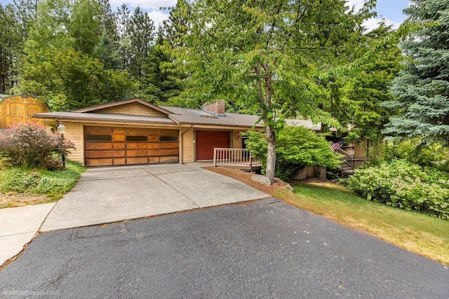 4012 S Terra Verde Dr, Veradale, WA 99037 - view of front facade featuring a chimney