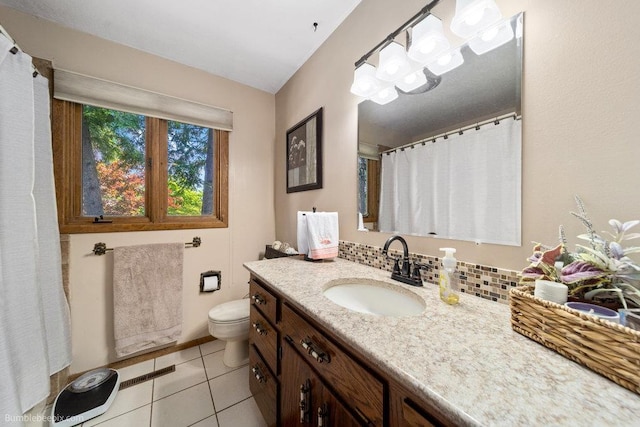 4012 S Terra Verde Dr, Veradale, WA 99037 - bathroom featuring vanity, toilet, and tile patterned floors