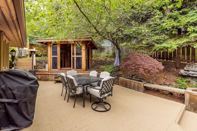 4012 S Terra Verde Dr, Veradale, WA 99037 - view of patio / terrace with grilling area, an outdoor structure, and outdoor dining area